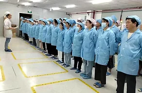Customer reviewing quality control processes in the factory
